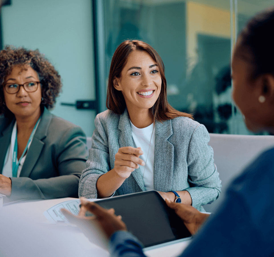 Business meeting with three female colleagues 