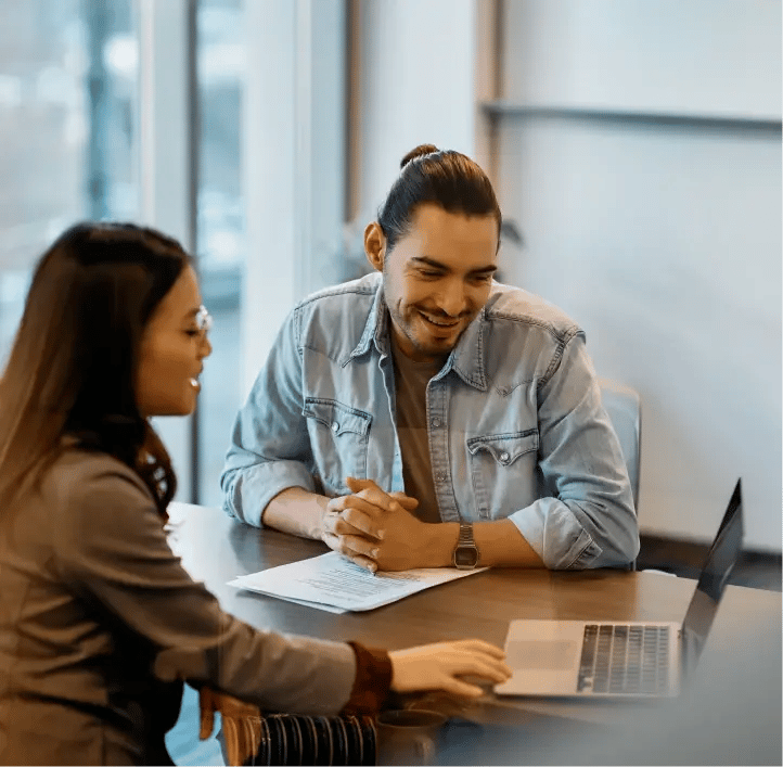 professionals discussing at a meeting table